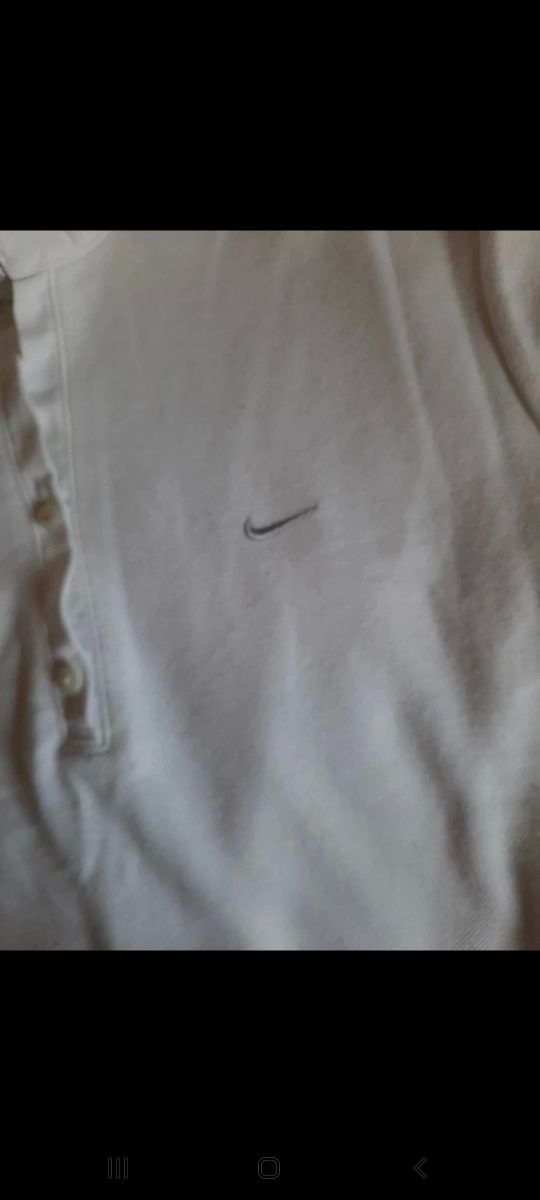 Polo mujer NIKE.