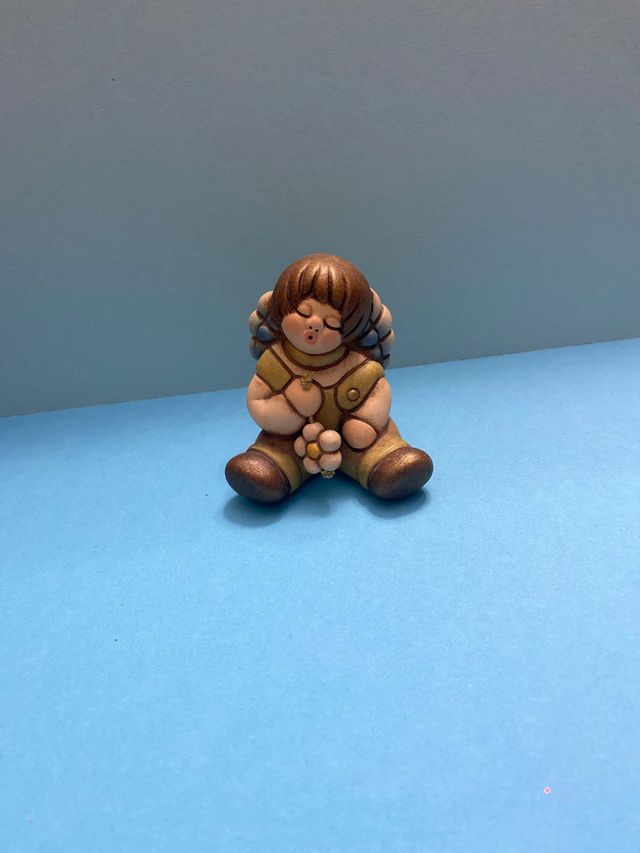 Bimbi con fiore thun