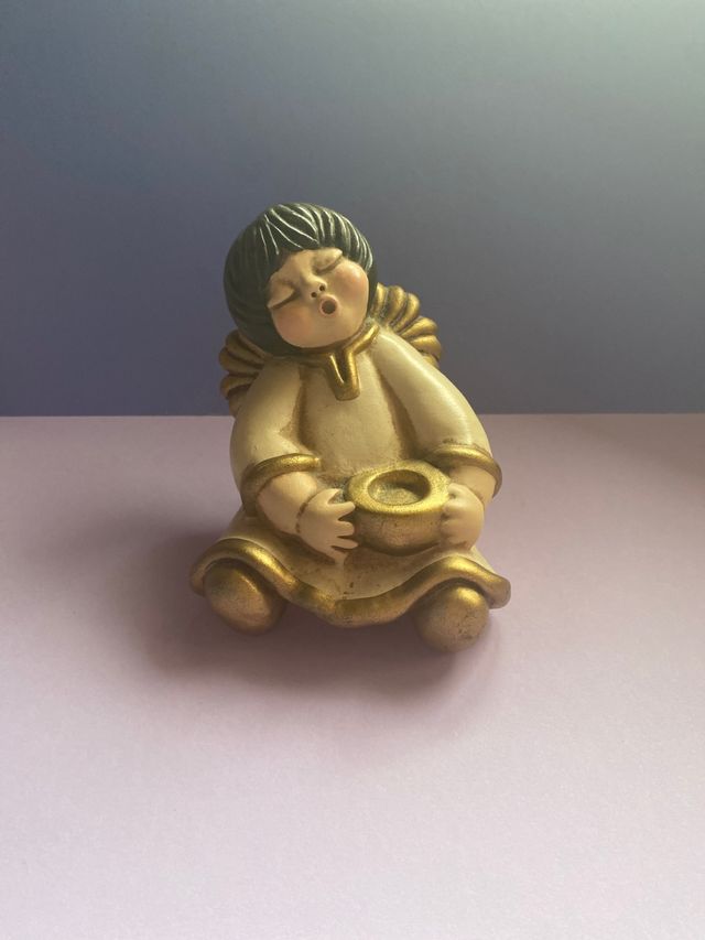 Angelo seduto/porta candela thun