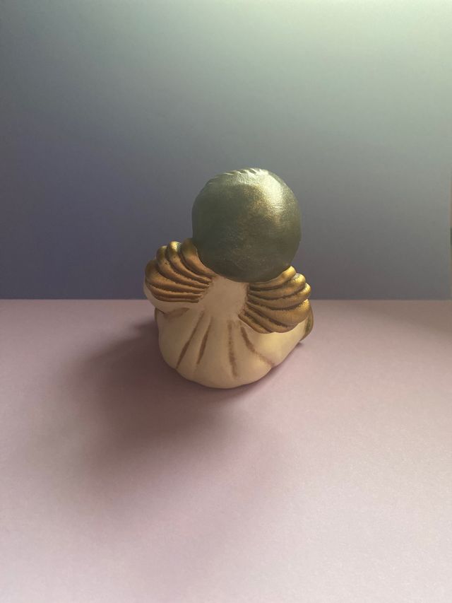 Angelo seduto/porta candela thun