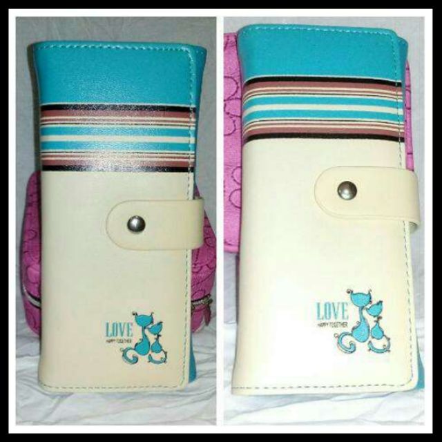 Estrenar Nueva.Cartera Celeste/Blanca dibujo Gatos