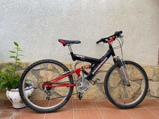 Bicicleta BTT doble suspensión Boomerang de segunda mano por 80 EUR en  Huertas en WALLAPOP