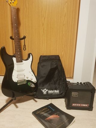 Guitarra electrica y Amplificador de segunda mano por 160 EUR en Alpedrete  en WALLAPOP