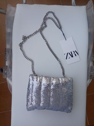Bolso fiesta lentejuelas plata Zara de segunda mano por 9 EUR en Manises en  WALLAPOP