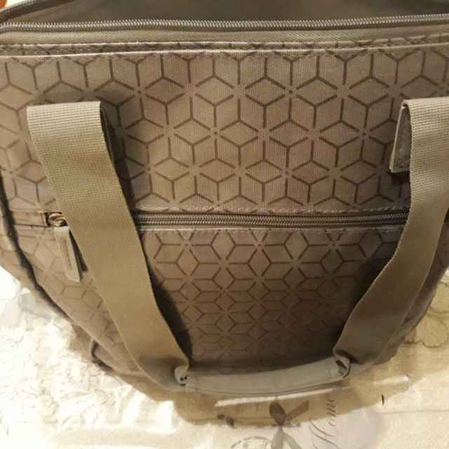 bolsa porta pañales y utensilios bebé.