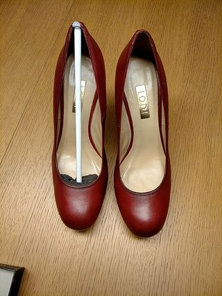 Tacones rojos plataforma de segunda mano por 38 EUR en Almería en WALLAPOP