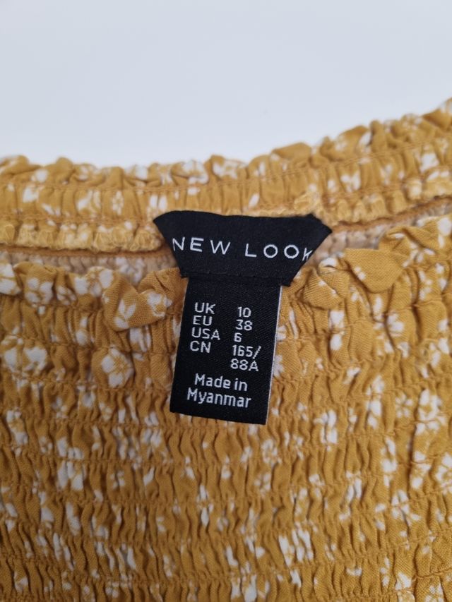 Camisa mangas anchas amarilla New Look. Talla 38