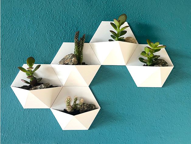 Conjunto de maceteros diseñados y fabricados por impresión 3D. Extraido de la tienda de Wallapopo de Estilo Industrial