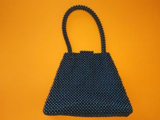 Bolso Fiesta de bolitas Azul Marino de segunda mano por 4 EUR en Archena en  WALLAPOP