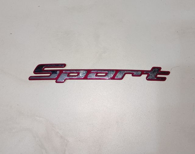 INSIGNIA ORIGINAL PARA COCHE SPORT