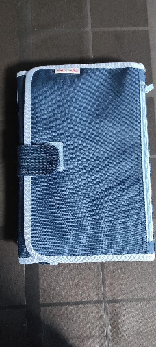 Cambiador de pañales portátil marca Munchkin