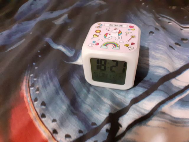 Reloj unicornio