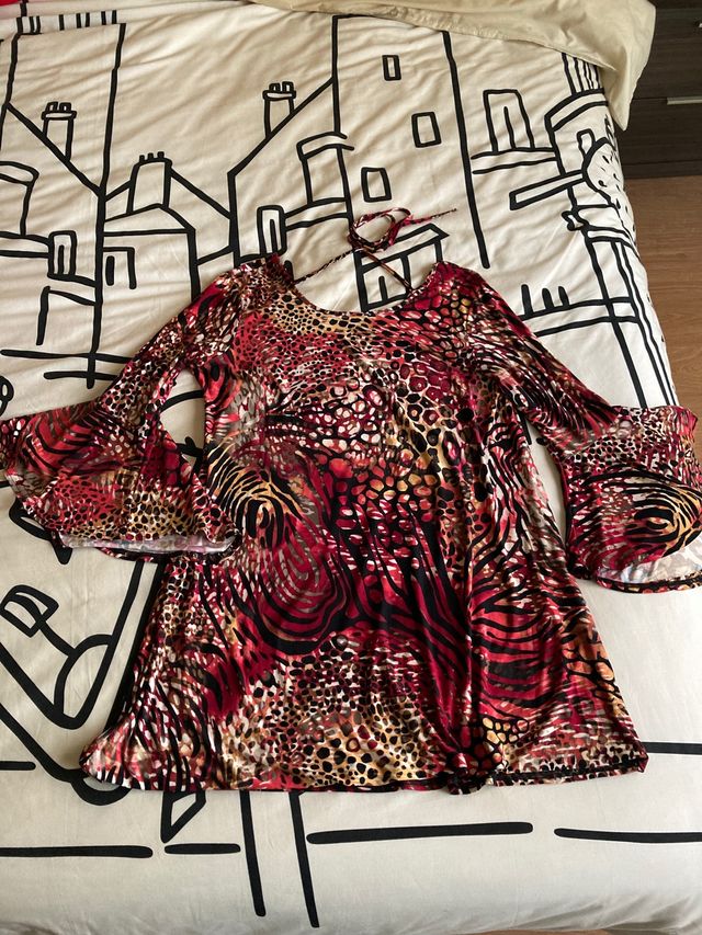 Vestido estilo flamenco en tonos rojizos