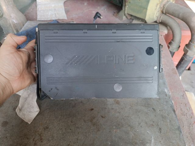 cargador de CDs Alpine