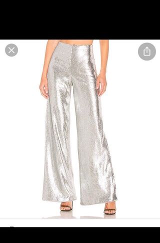 Pantalones plateados fiesta de segunda mano por 40 EUR en Nueva Andalucia  en WALLAPOP