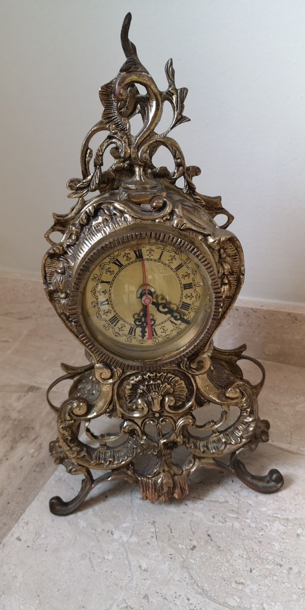 Reloj antiguo de bronce