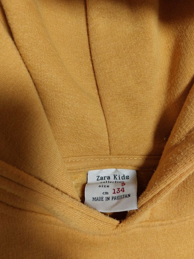 Sudadera niña mostaza con capucha. 9años