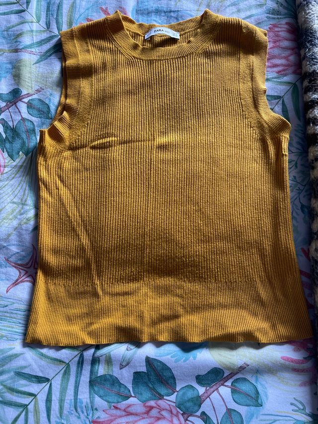 Suéter sin mangas de canalé