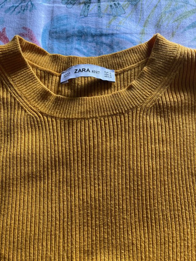 Suéter sin mangas de canalé