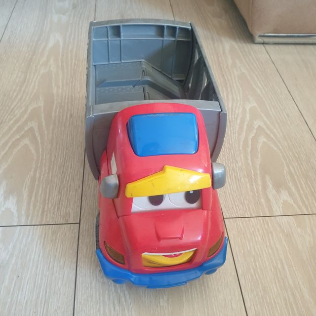 Juguete Fisher Price niño camión