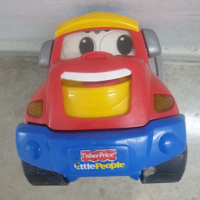Juguete Fisher Price niño camión