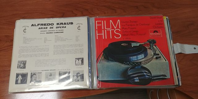 DISCOS VINILOS carpeta y varios vinilos