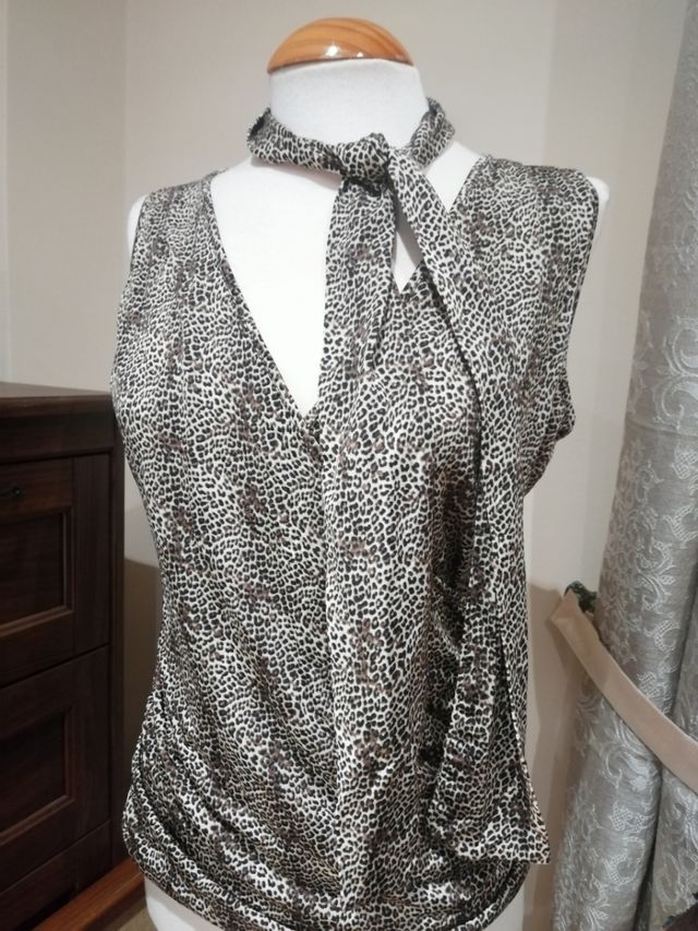 Preciosa blusa animal print leopardo