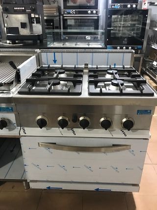Cocina 4 fuegos con horno nueva de segunda mano por 1.500 EUR en Madrid en  WALLAPOP