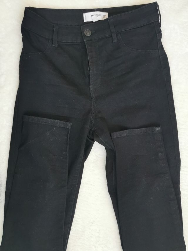 Calças skinny pretas. Tiro alto. Manga