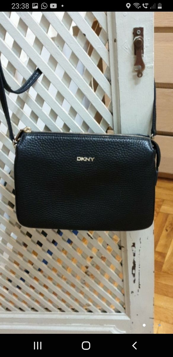 DkNY original impecable