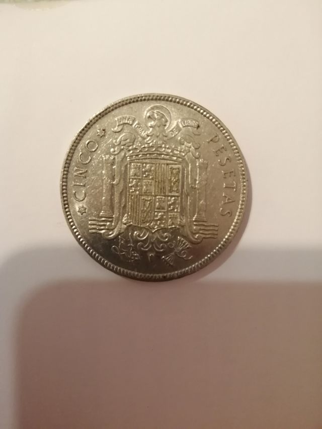 moneda de 5 pesetas de nike