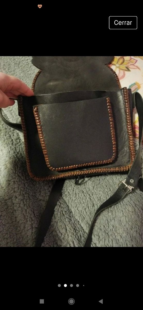 bolso de cuero artesanal hecha un ojo