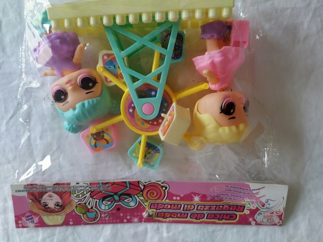 2 muñecas con noria