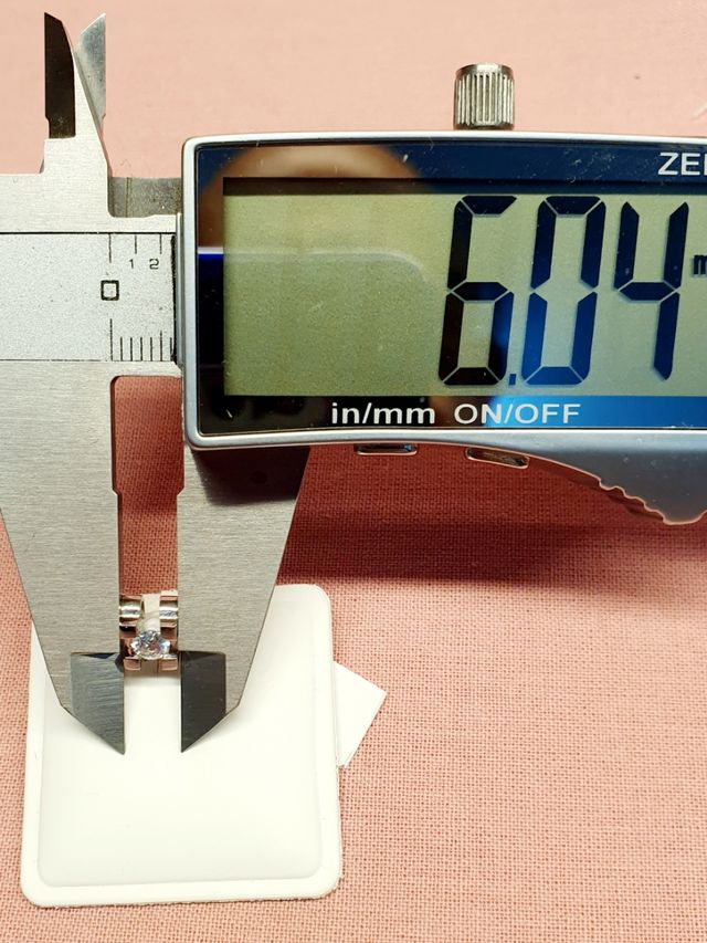 Colgante 0.18kl oro blanco  diamante VSI