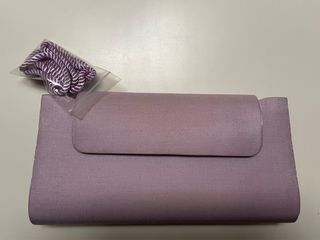 Bolso fiesta, malva, nuevo. de segunda mano por 18 EUR en Barcelona en  WALLAPOP