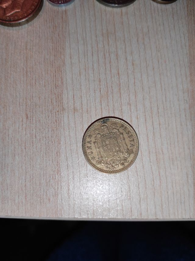 1 peseta