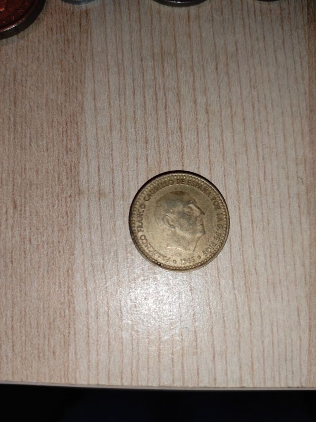 1 peseta