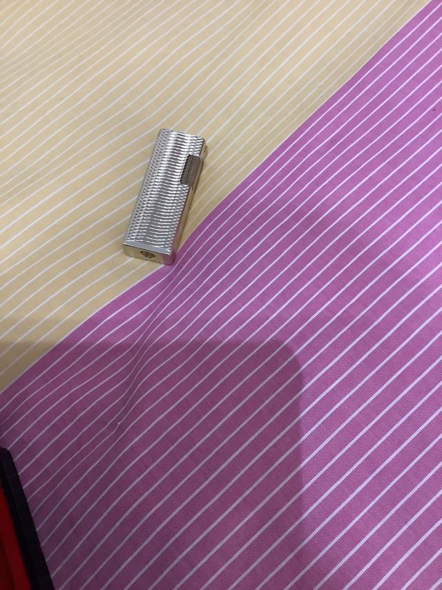 Mechero dorado Unicorn. De coleccion