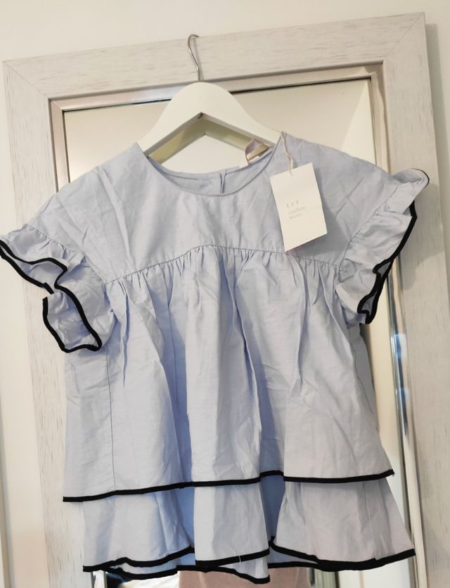 Preciosa camisa con volantes