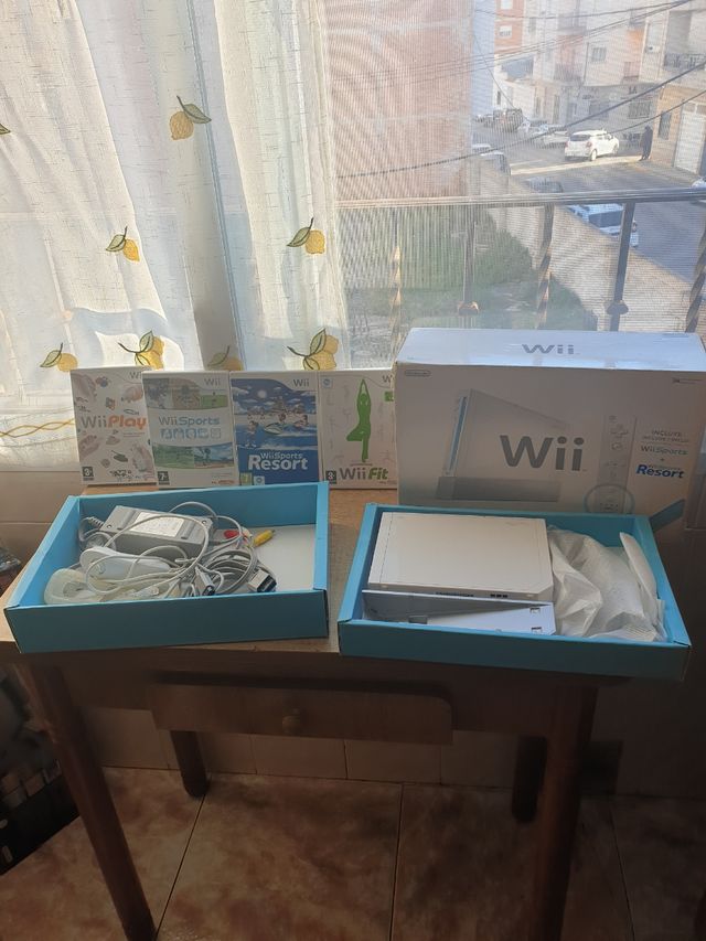 wii completa con 4 juegos 