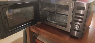 Microondas Qilive q.6865 combi horno grill de segunda mano por 65 EUR en  Sevilla en WALLAPOP