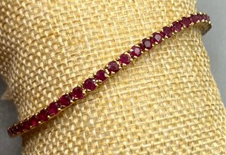 Pulsera de oro de 18 kt con rubíes