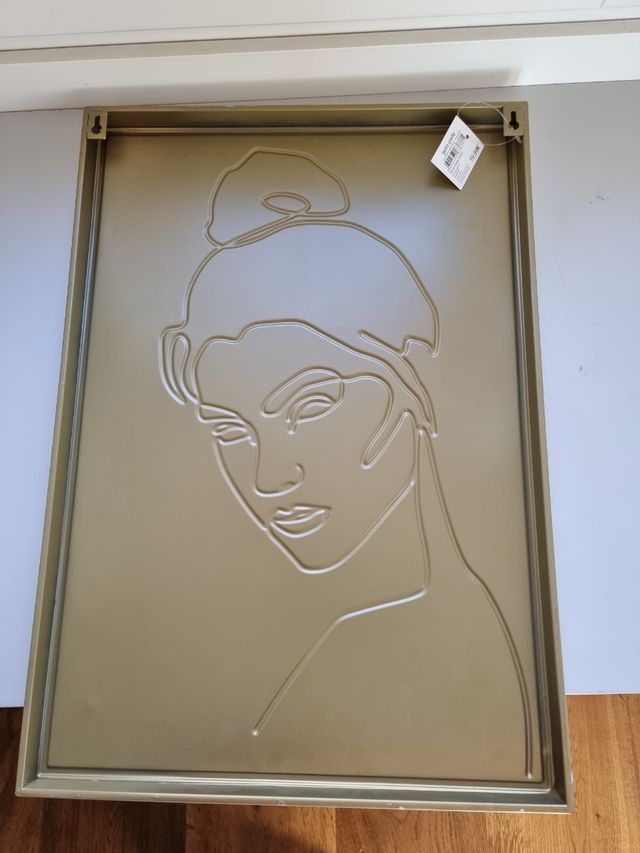 dos cuadros de metal GATO PRETO ,15€ cada uno