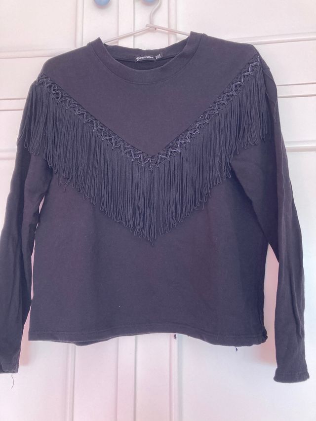 Jersey con flecos