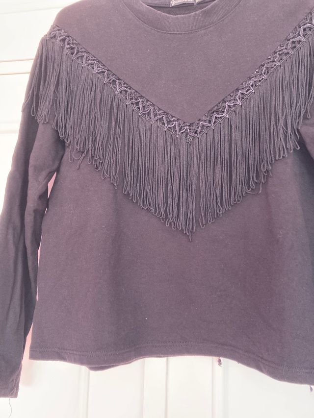 Jersey con flecos