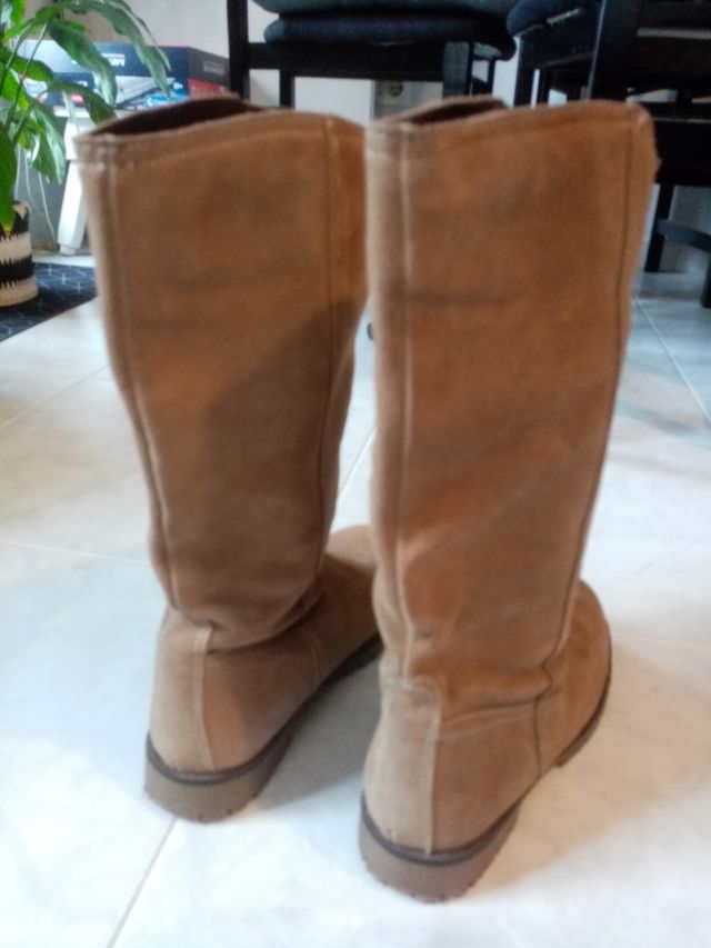 Botas altas.