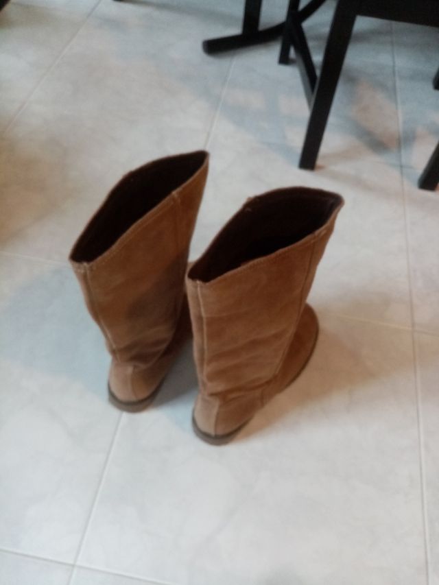 Botas altas.
