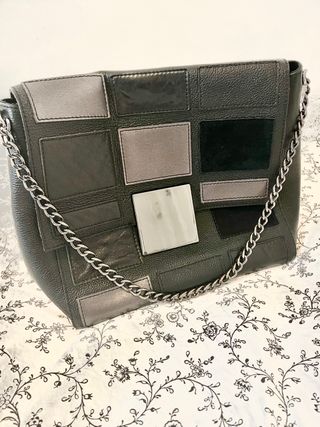 Bolso negro Purificación Garcia de segunda mano por 40 EUR en Madrid en  WALLAPOP