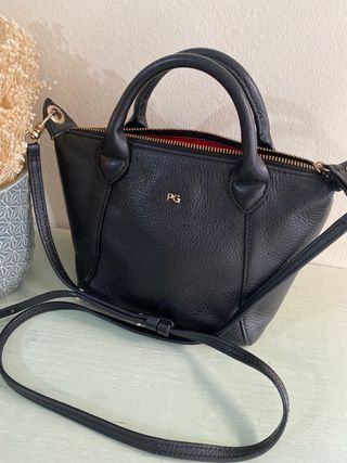Bolso negro Purificación García de segunda mano por 60 EUR en Oviedo en  WALLAPOP