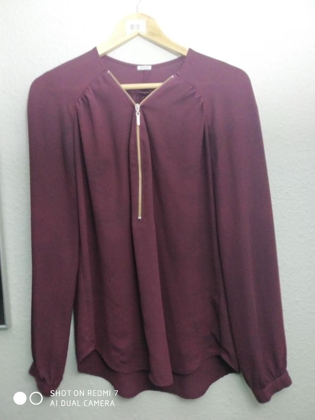 si te llevas 5 blusas12€, si son separadas 4€